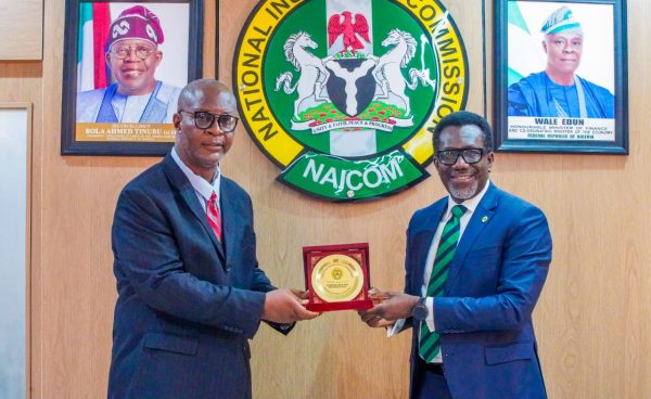The Commissioner for Insurance Mr. Olusegun Ayo Omosehin with the President of ILAN Pastor Ikechukwu Udobi