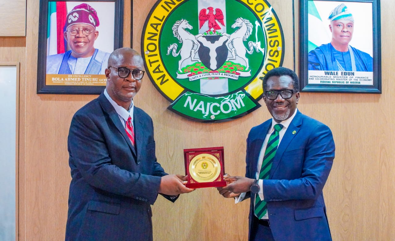 The Commissioner for Insurance Mr. Olusegun Ayo Omosehin with the President of ILAN Pastor Ikechukwu Udobi